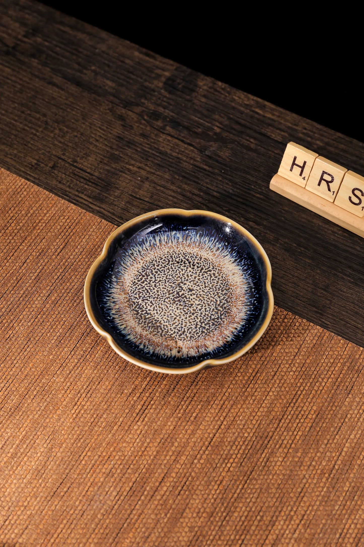Blue Jian Zhan style ceramic tea cup with gold-rimmed matching plate on wooden table – Japanese style drinkware gift set