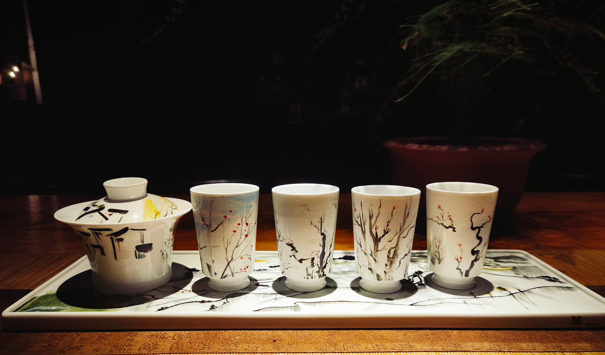 Front view of underglaze tea set decorated with Wu Guanzhong style abstract scenery art