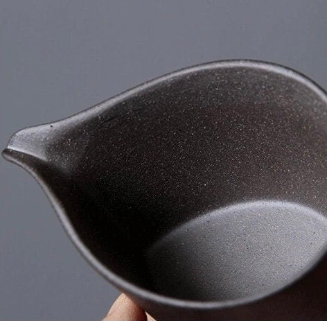 Handmade ceramic jug with vintage glaze finish, eco-friendly and artisan-crafted