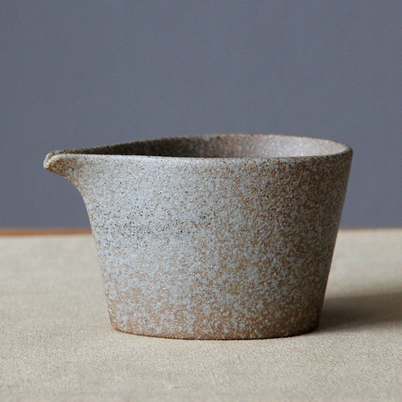 Handmade natural tone ceramic creamer jug with beak-shaped spout by Home Relax Studio_beige white color with natural glaze patterns