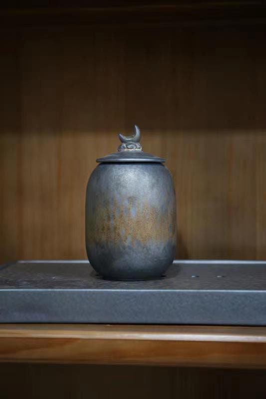 Rustic ceramic canister with gold and silver glaze for tea lovers – seamless moon theme jar