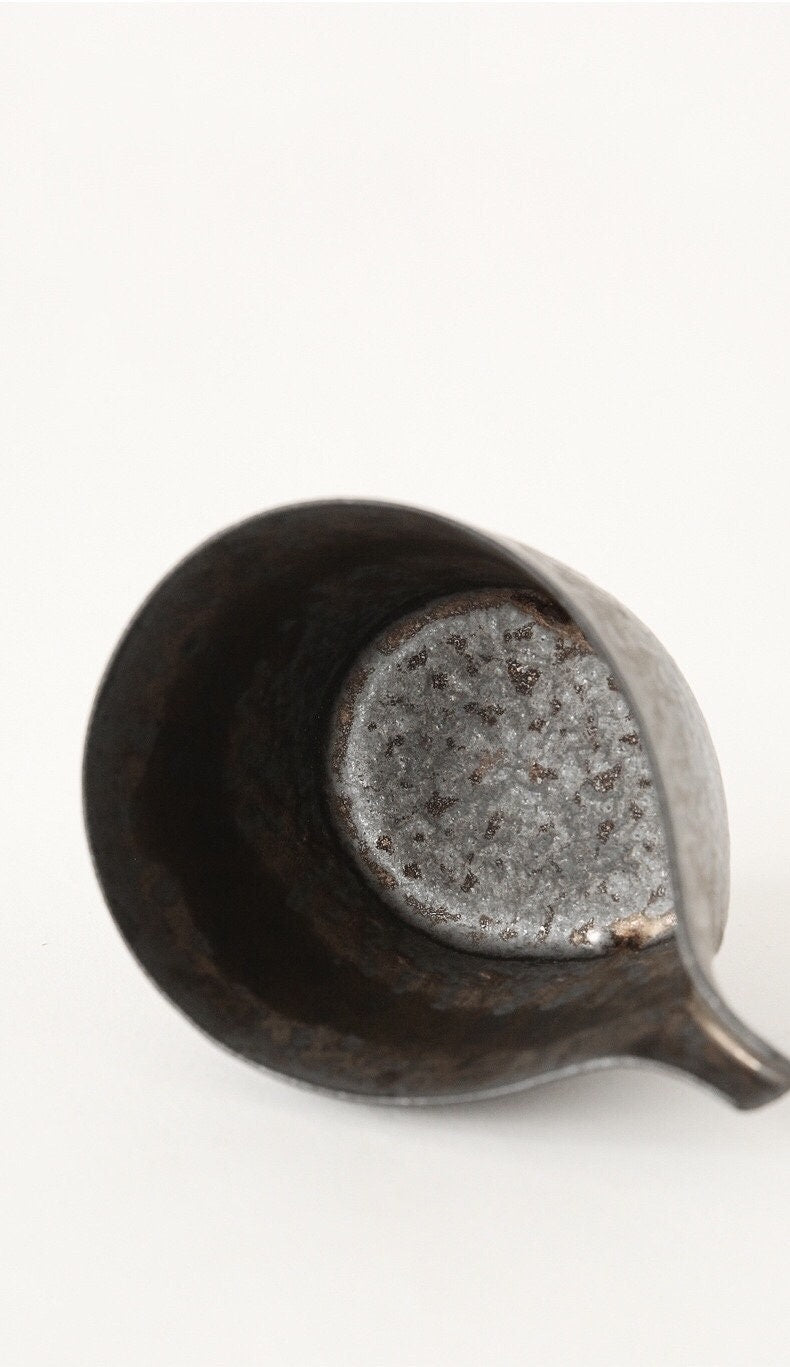 Top view of handmade ceramic pitcher with rustic glaze finish_from Home Relax Studio